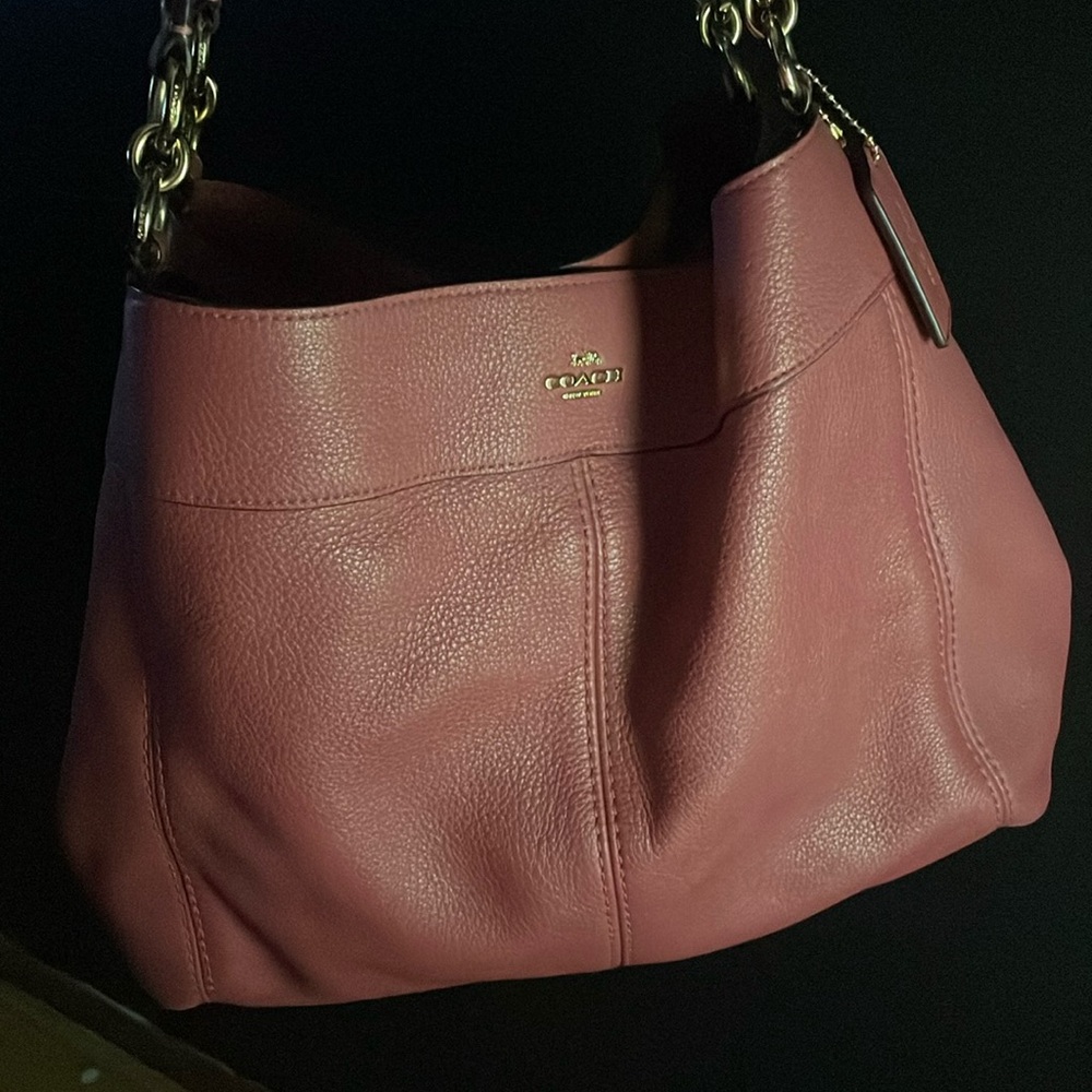 Deep rosey pink/ blush color COACH bag.